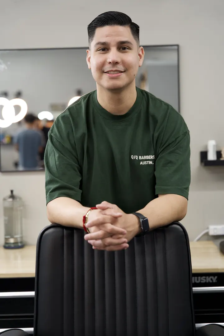 Carlos Rodriguez behind the chair